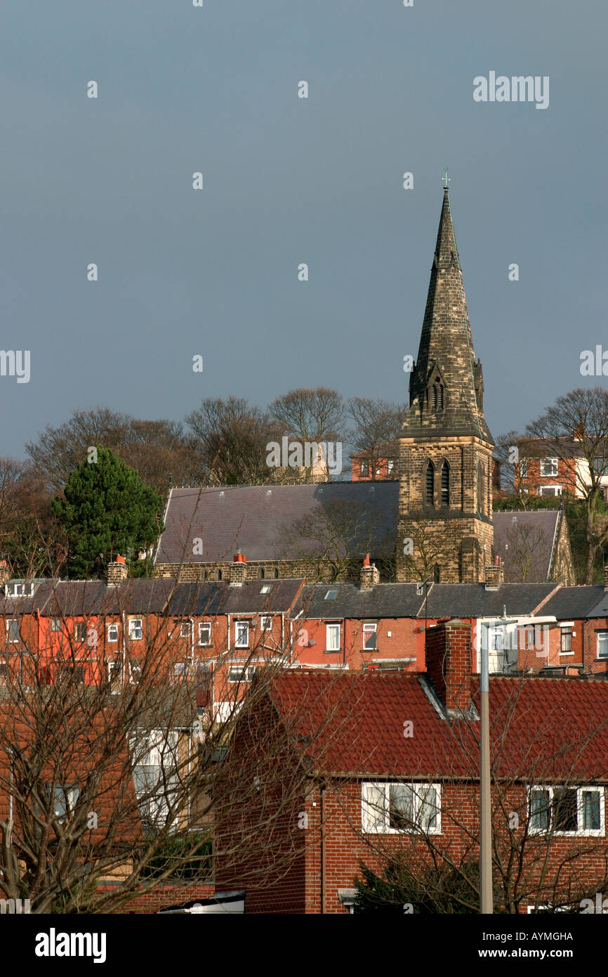 Worsbrough St Thomas Church visible above houses Stock Photo Alamy