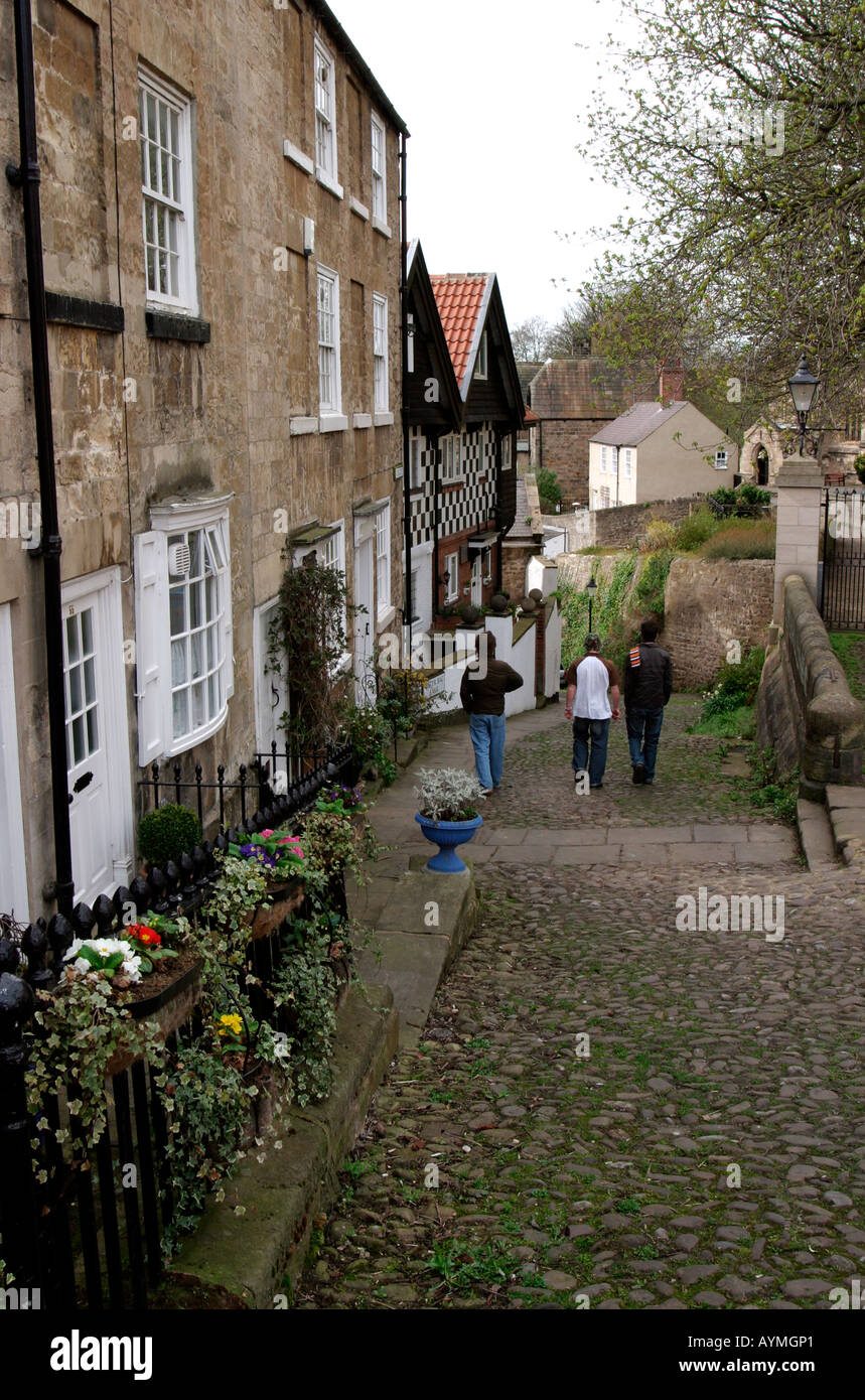 Cobbled road and cottages Water Bag Bank Knaresborough North Yorkshire Stock Photo