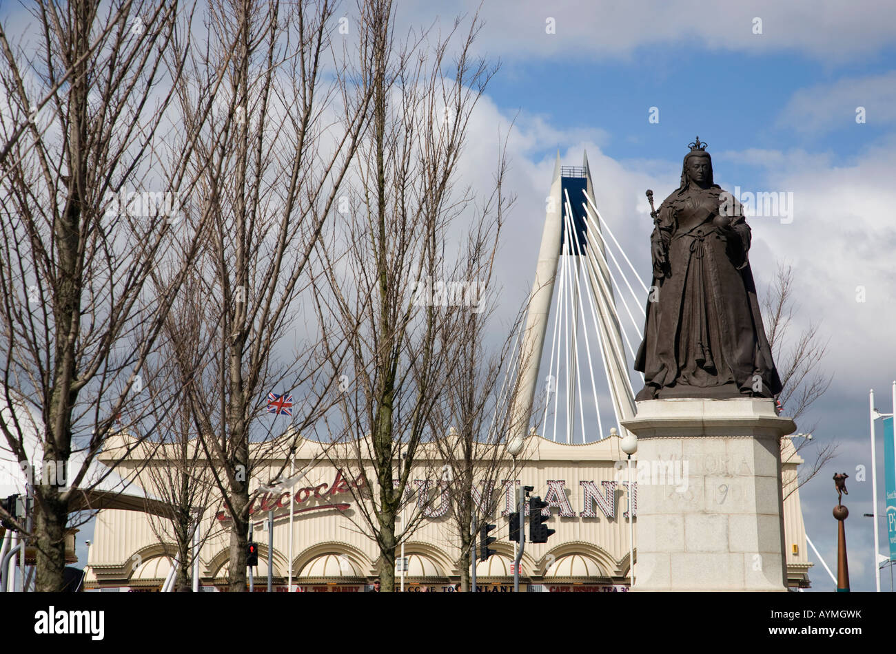 Statue of Queen Victoria on the Promenade at Southport with the marine Way bridge in the