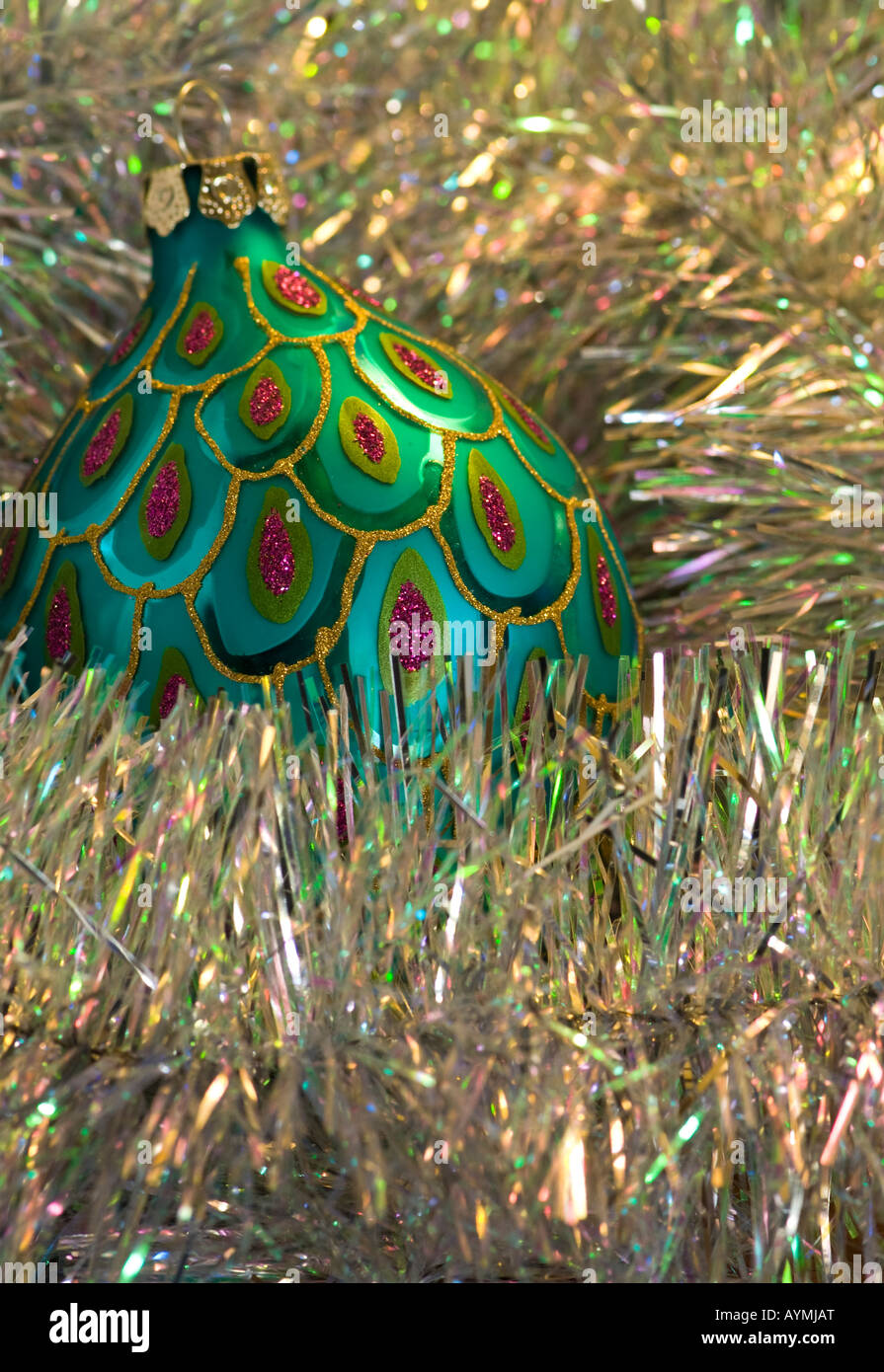 A Christmas tree bauble and silver tinsel Stock Photo - Alamy