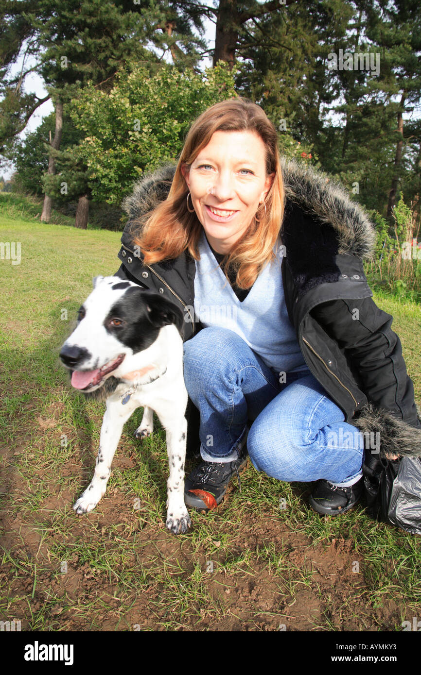 Tara pet dog female owner black white dalmation spots Harpenden common Hertfordshire England happy Stock Photo