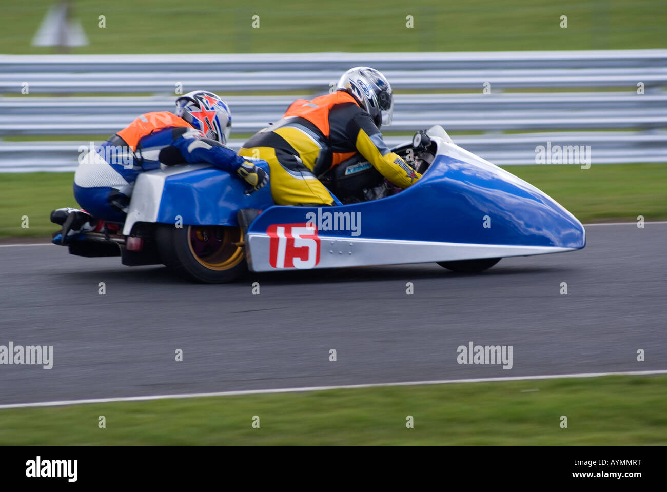 Motorbike and Sidecar at Wirral 100 Motor Club Race Meeting at Oulton Park Motor Racing Circuit Cheshire England Stock Photo