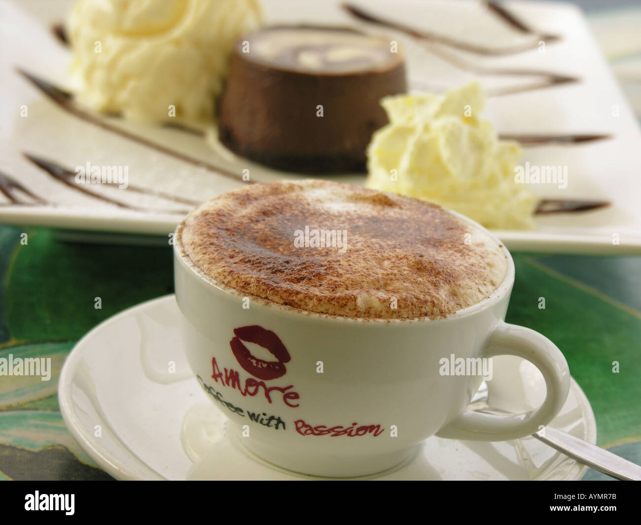 Cappuccino coffee with chocolate pudding cream and vanilla ice cream on ...
