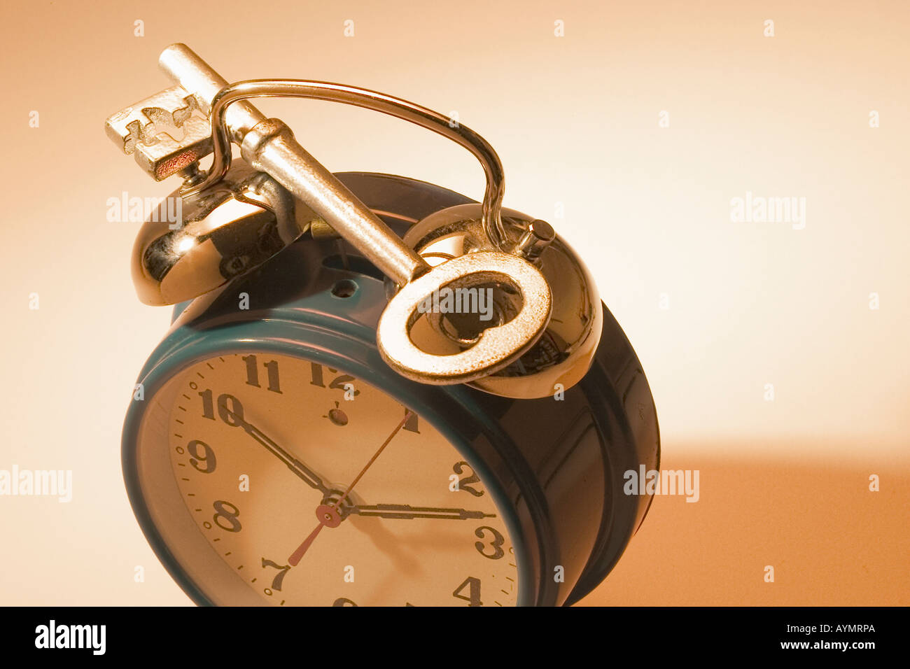 Skeleton Key on Alarm Clock Stock Photo Alamy