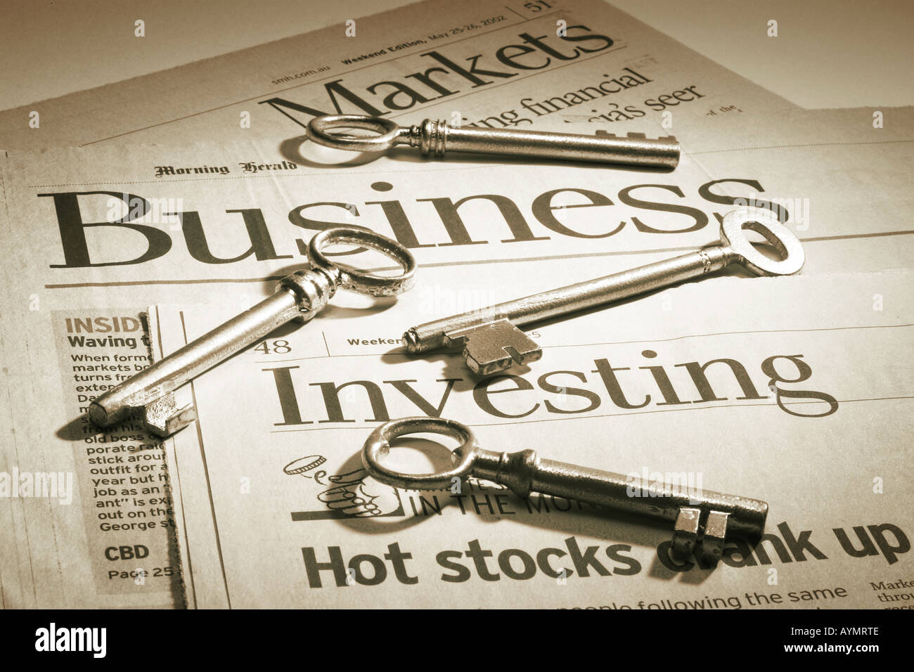 Skeleton Keys on Financial Newspapers Stock Photo