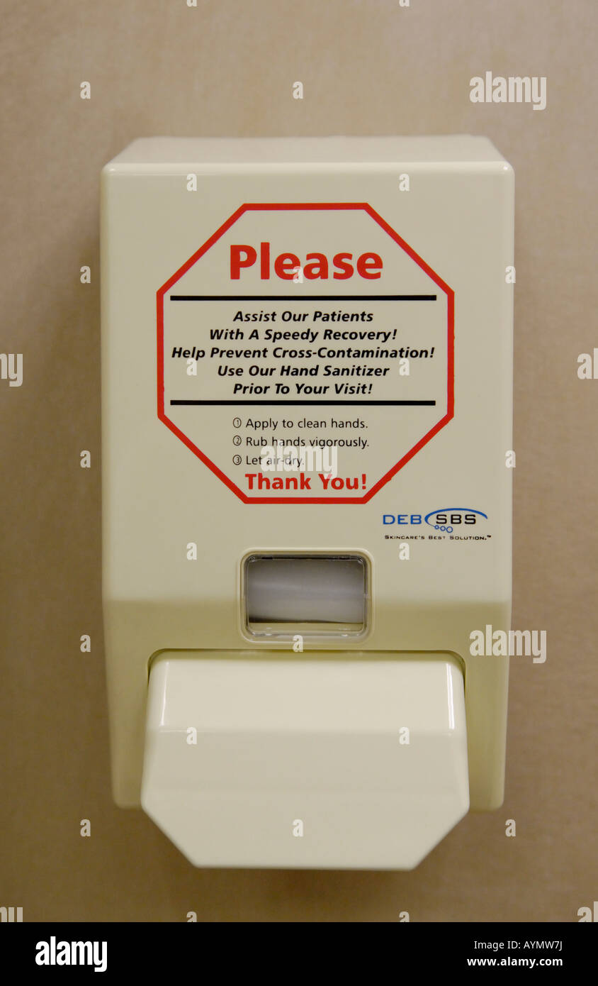 Dispenser of sanitizing disinfectant at hospital Stock Photo