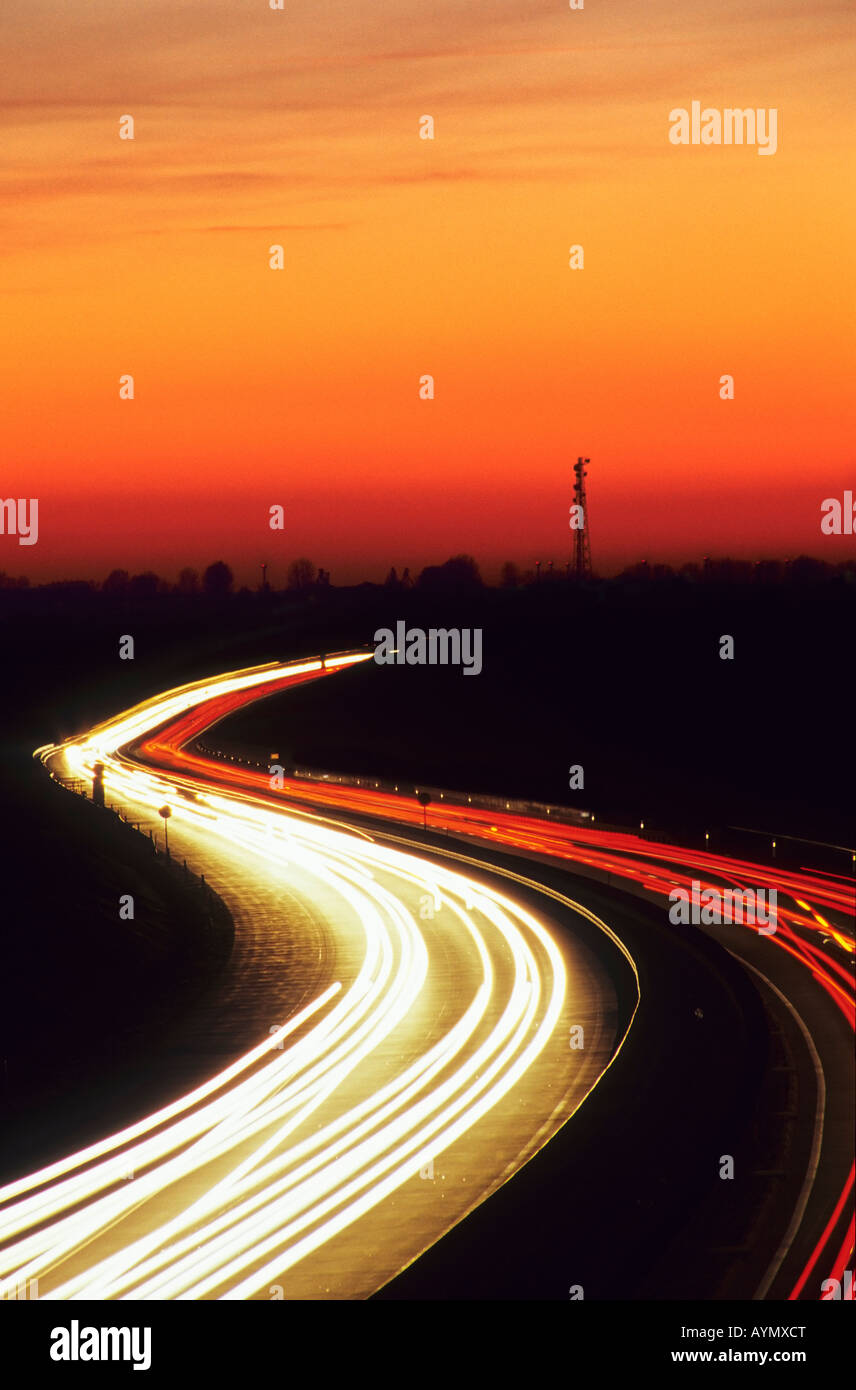 traffic light trails on motorway at dusk Stock Photo - Alamy