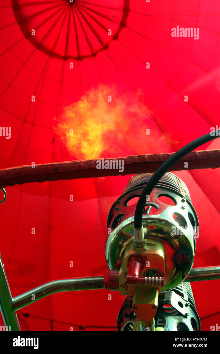 Gas flame burn blow inflate hot air red balloon Stock Photo Alamy