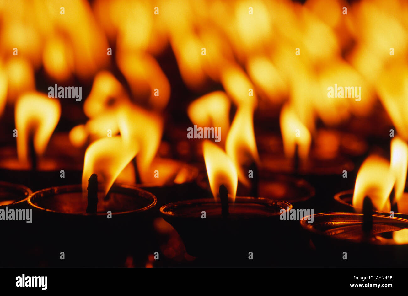 Votive candles close up. Stock Photo