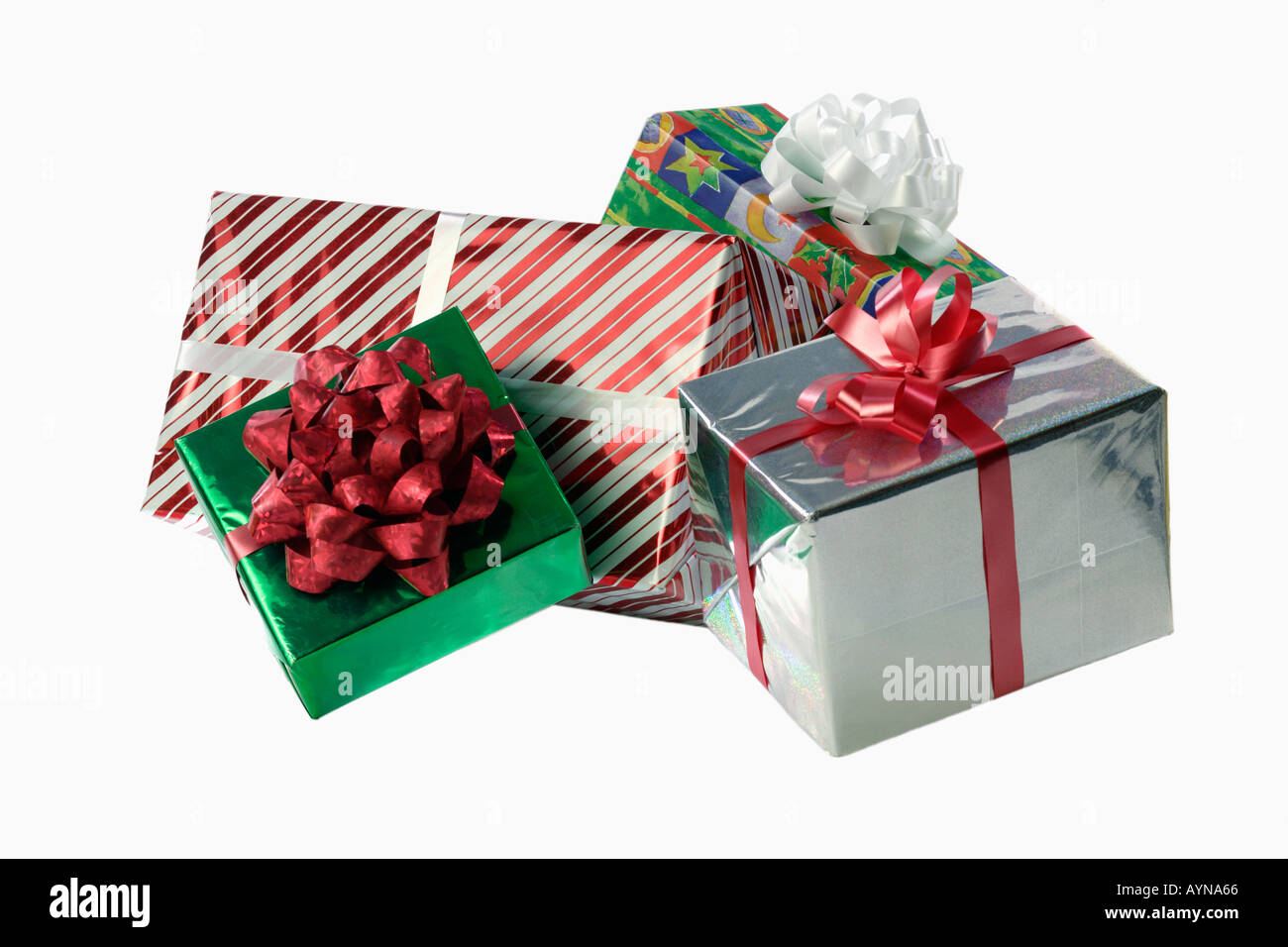 Still life of gift wrapped presents with an ornate bow isolated on a white background Stock Photo