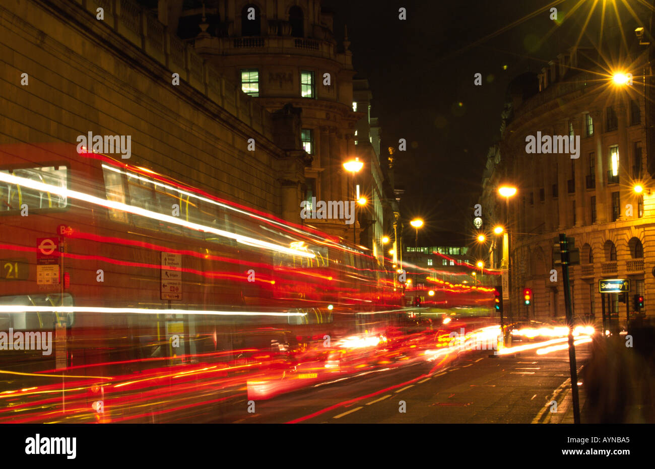 Abstract traffic blur shot with Lonond Bus at night, City of London, UK Stock Photo
