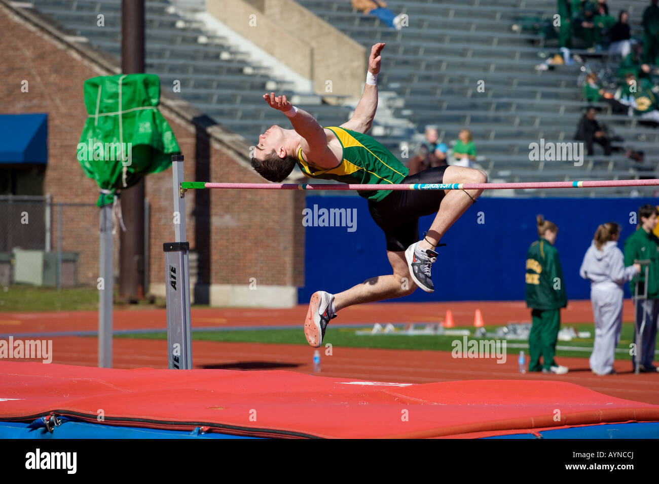High jumper clears the bar Stock Photo Alamy