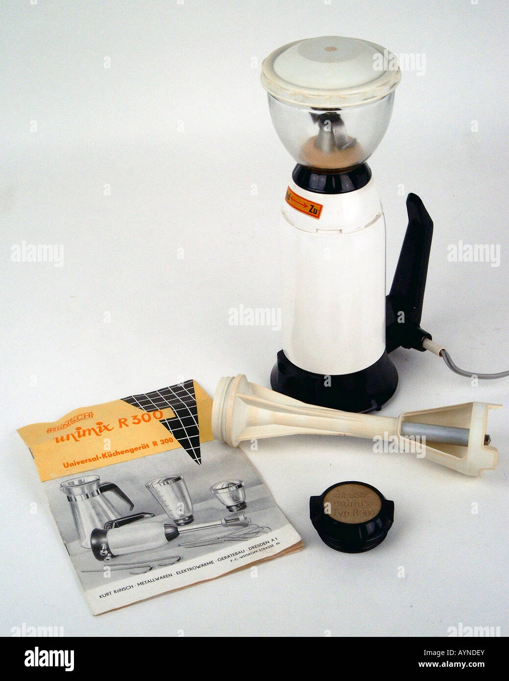 https://c8.alamy.com/comp/AYNDEY/household-kitchen-and-kitchenware-electric-hand-grater-unimix-r-300-AYNDEY.jpg