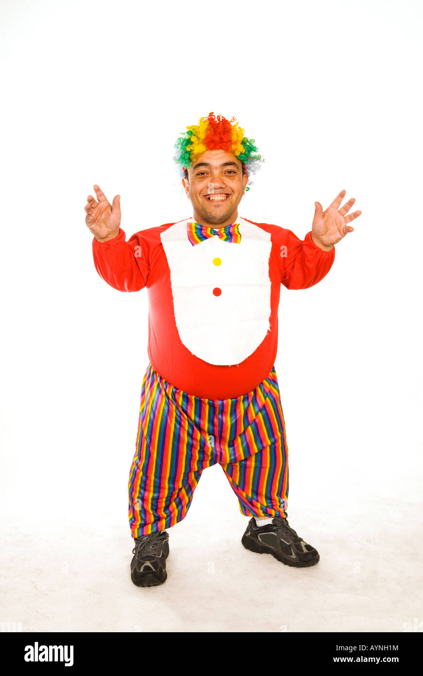 Full Length Portrait Of A Happy Midget Clown Against A White Stock   Full Length Portrait Of A Happy Midget Clown Against A White Background AYNH1M 