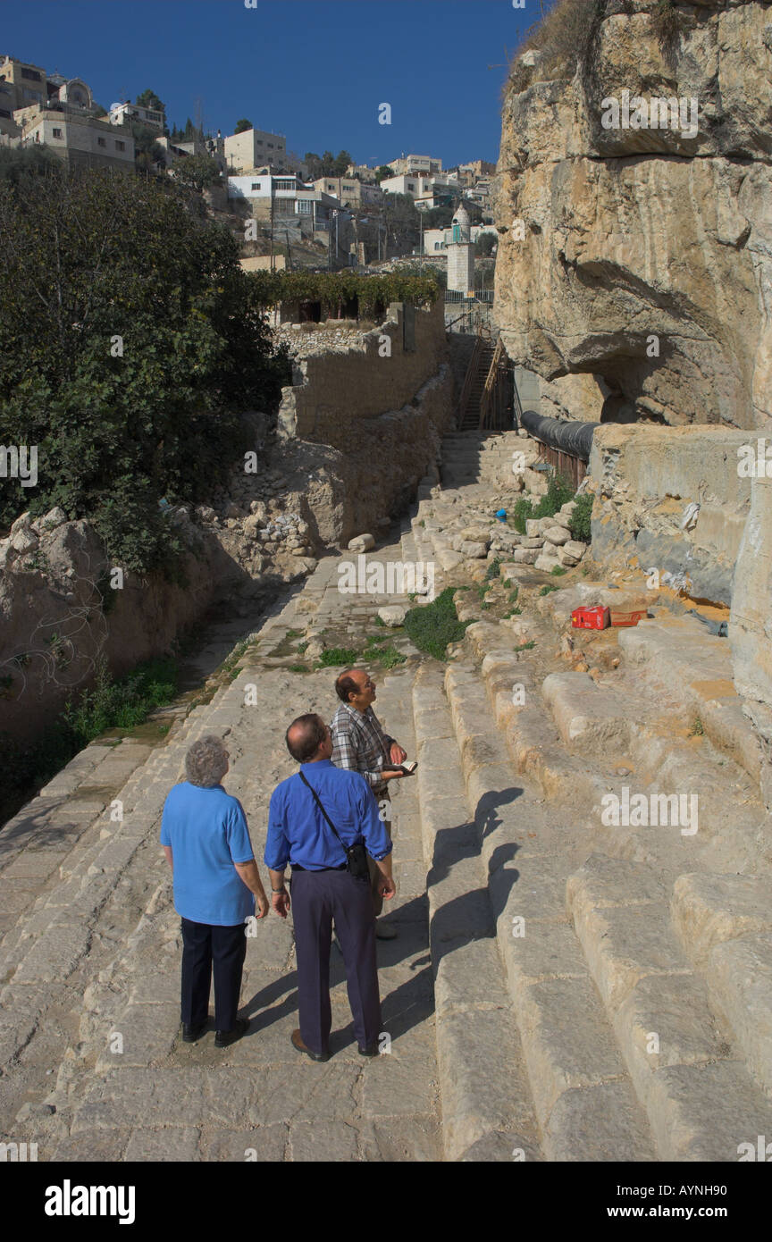 Israel Jerusalem Village of Silwan new pool of the Siloah 2nd temple period discovered 2004 vertical view with people Stock Photo