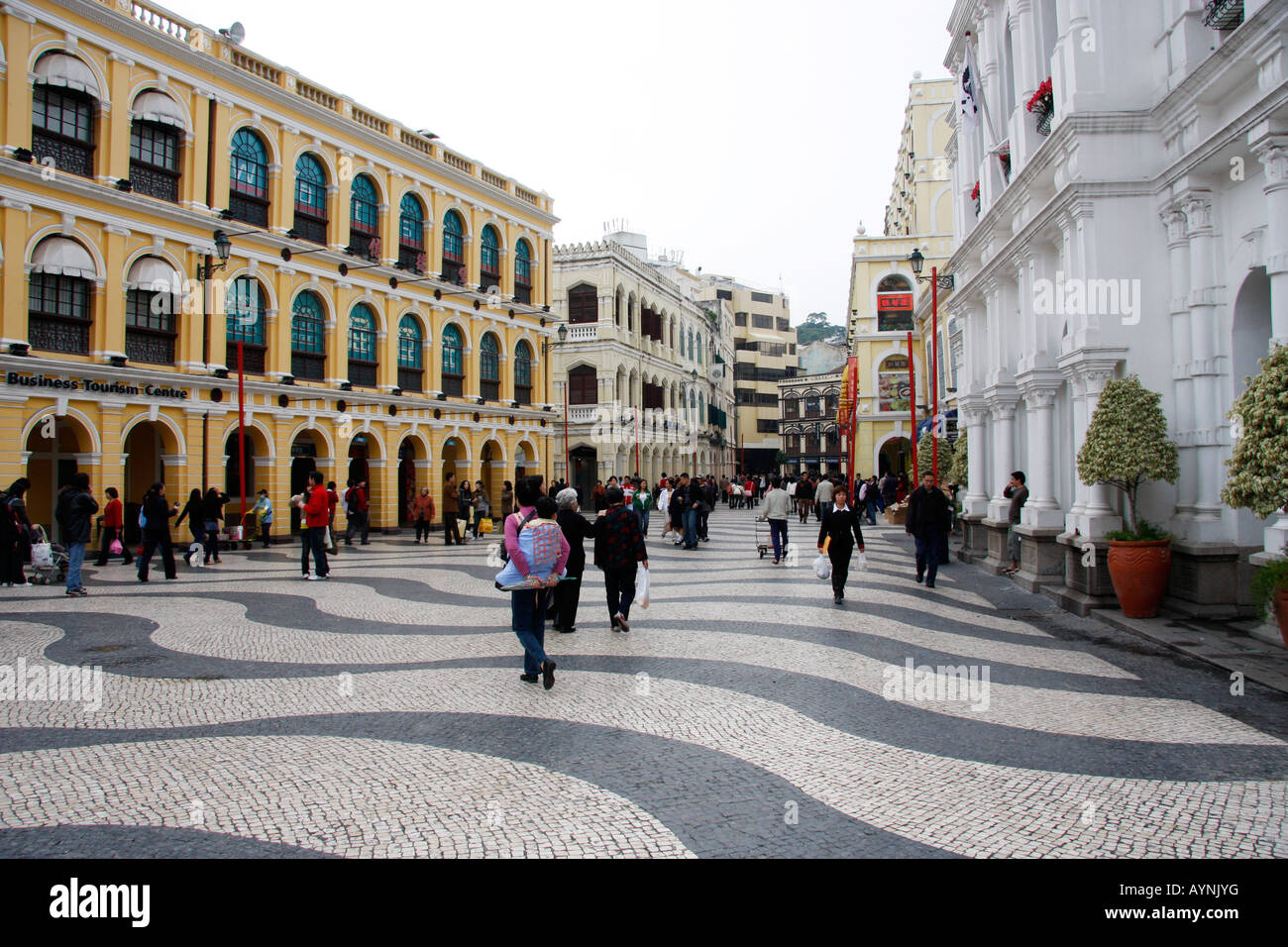 SENADO SQUARE WITH TRADITIONAL SWIRLING BLACK AND WHITE PAVING IS THE FOCAL POINT OF THE HISTORIC PORTUGUESE CENTRE OF MACAU Stock Photo