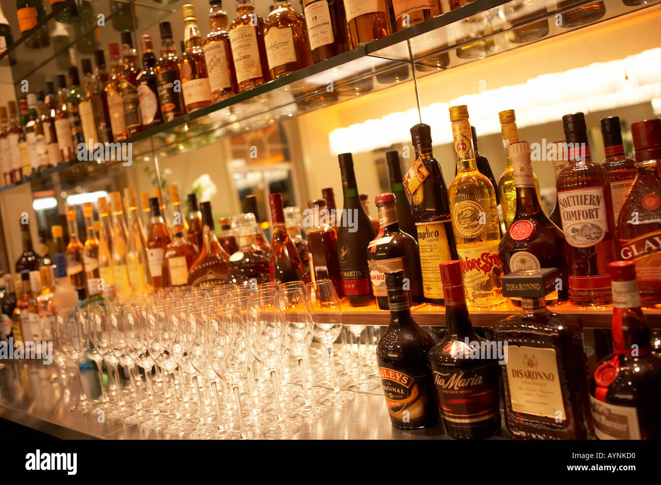 BOTTLES AND GLASSES ON HOTEL BAR Stock Photo Alamy
