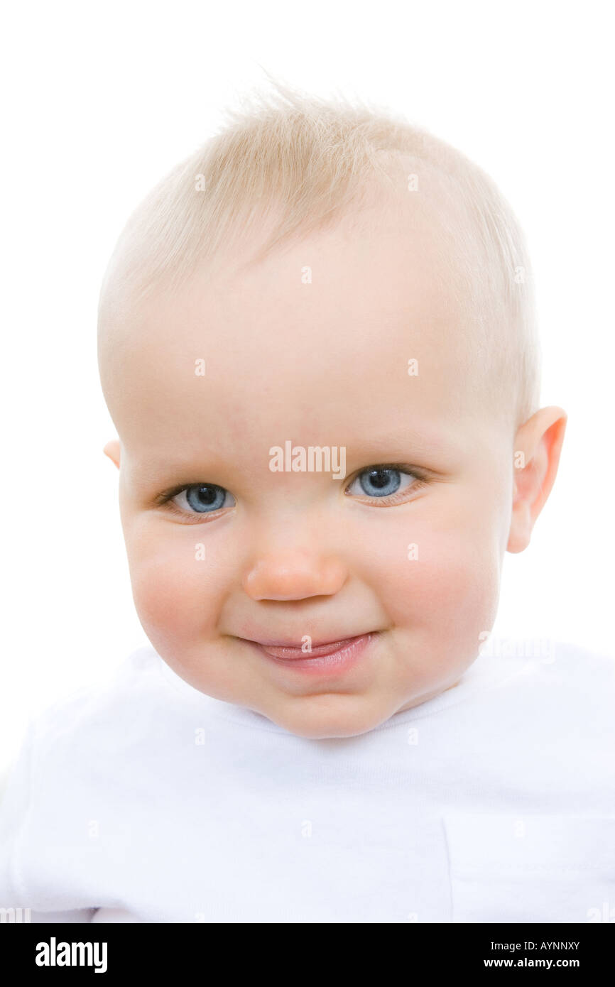 Cute infant sticking out his tongue Stock Photo Alamy