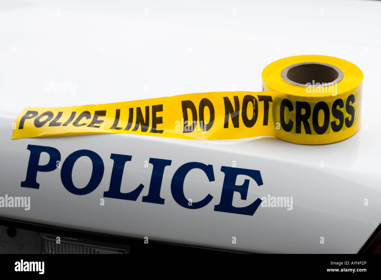 Police Car with Crime Scene Tape Stock Photo