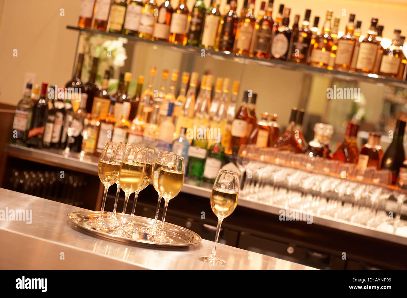 BOTTLES AND GLASSES ON HOTEL BAR Stock Photo Alamy