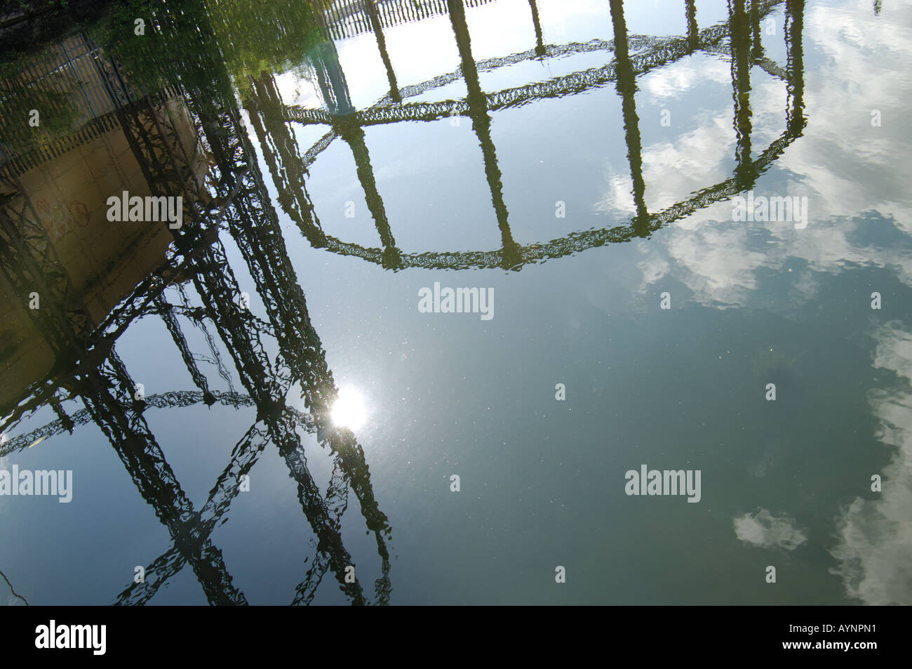 Reflection of gas towers in Regent Canal, London Stock Photo Alamy