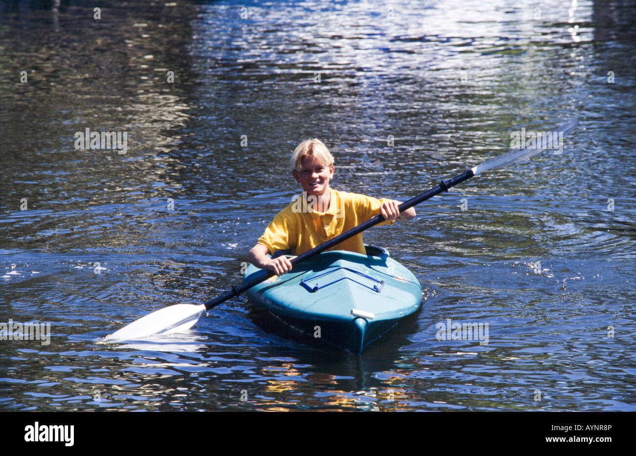 Teenage boy in Kayak, Miami Stock Photo Alamy