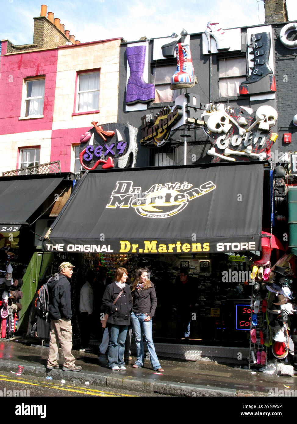 UK- Tourists and visitors outside the original Dr. Martens shoe shop in  Camden market, London. Photo © Julio Etchart Stock Photo - Alamy