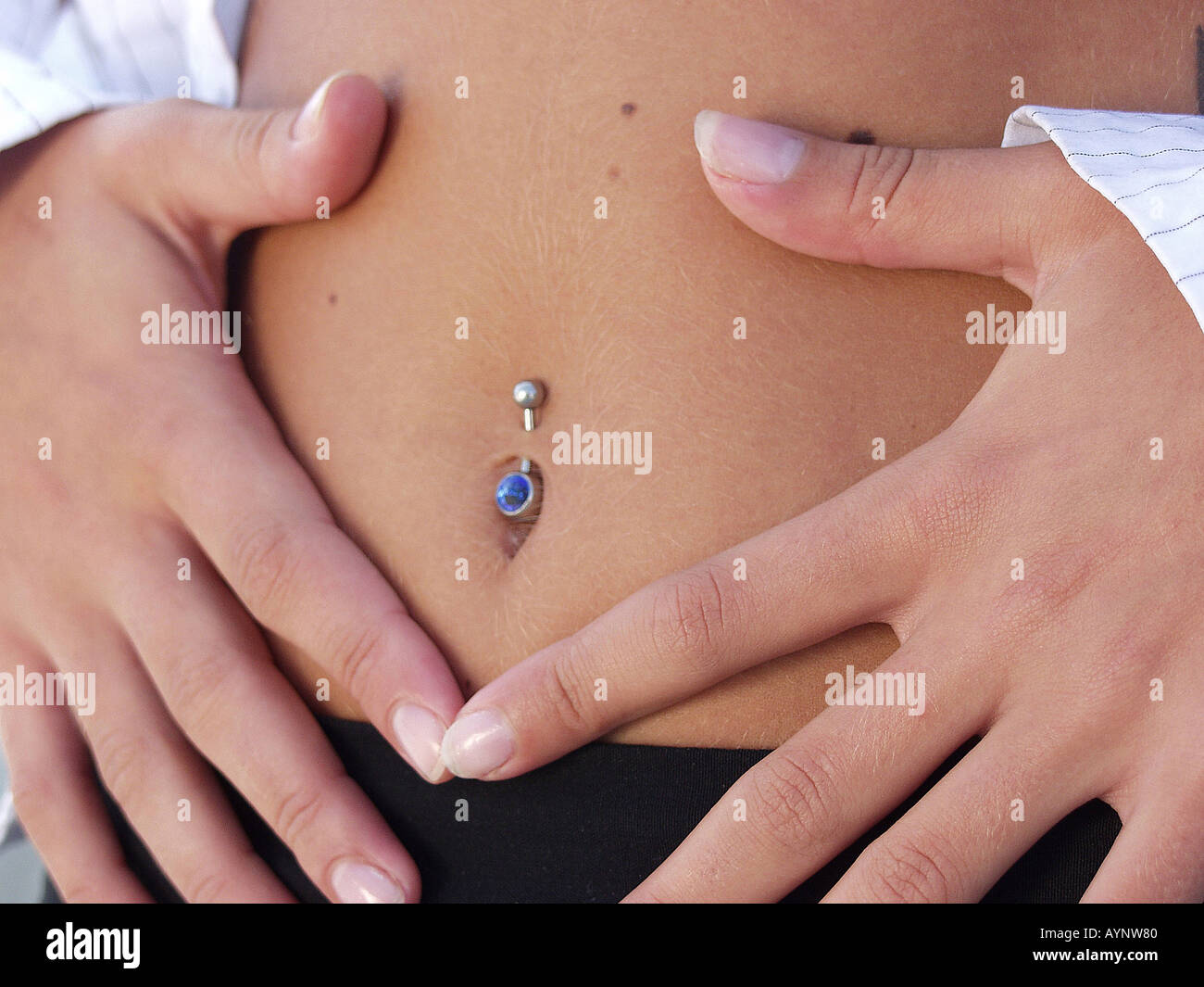 Bauchnabel piercing hi-res stock photography and images - Alamy