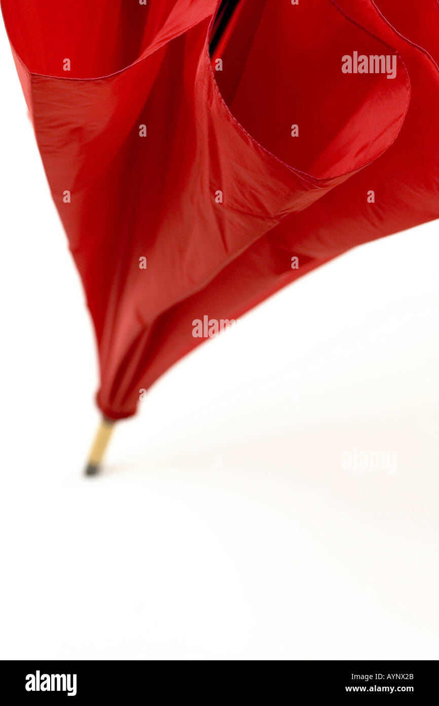 Geschlossener roter Regenschirm Stock Photo