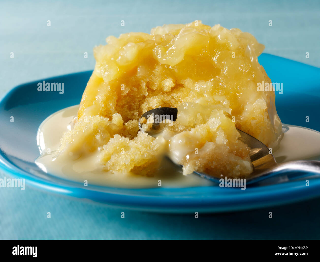Eves Pudding and custard. Traditional British pudding Stock Photo Alamy