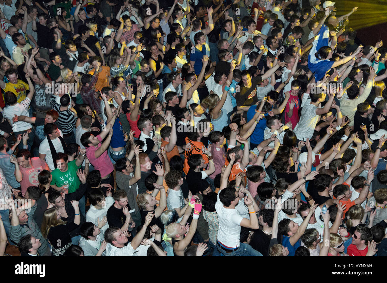 Concert crowd dancing and enjoying a DJ set in London. Stock Photo