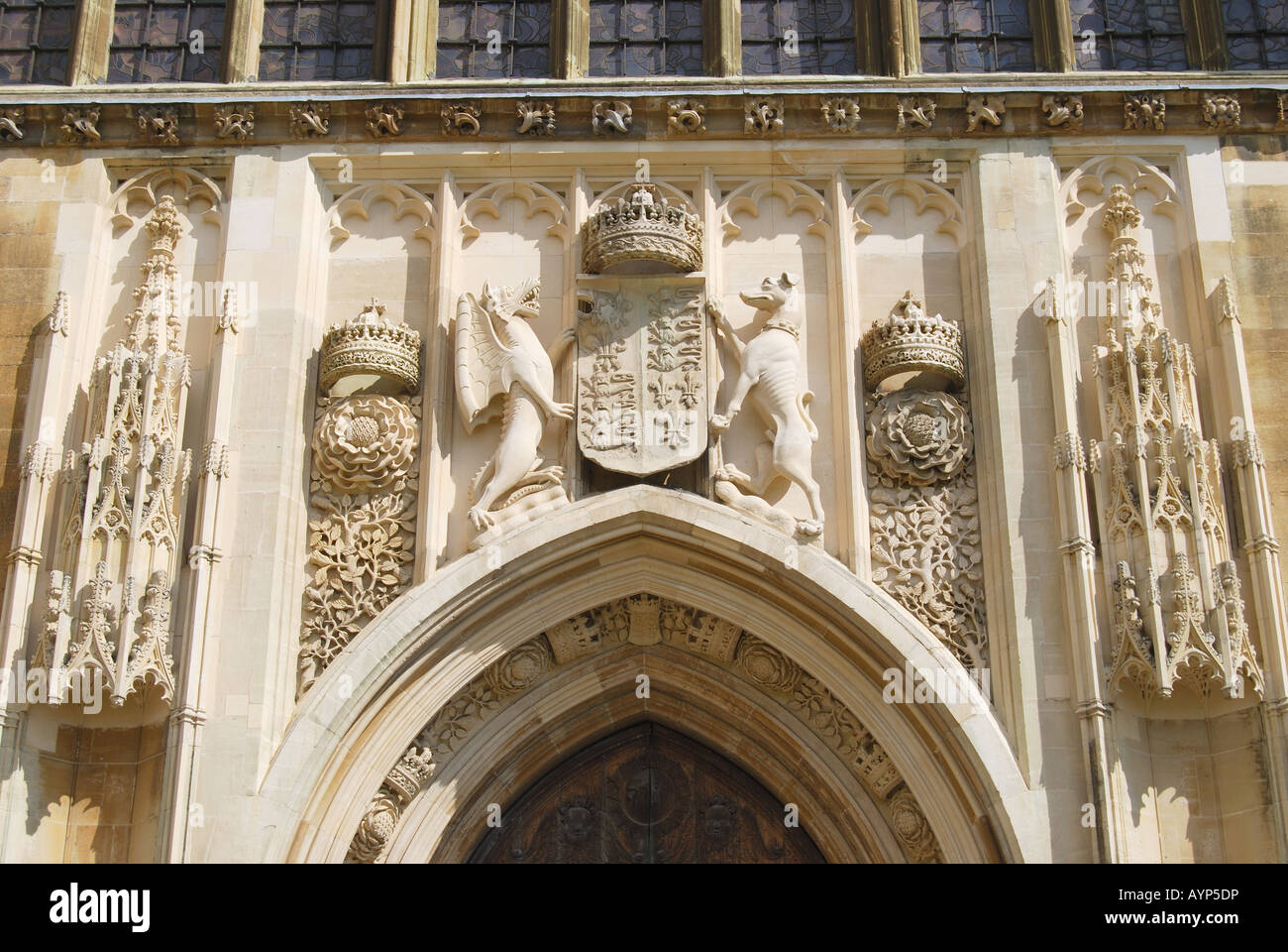 Stone carvings above door, King's College Chapel, King's College, Cambridge, Cambridgeshire, England, United Kingdom Stock Photo