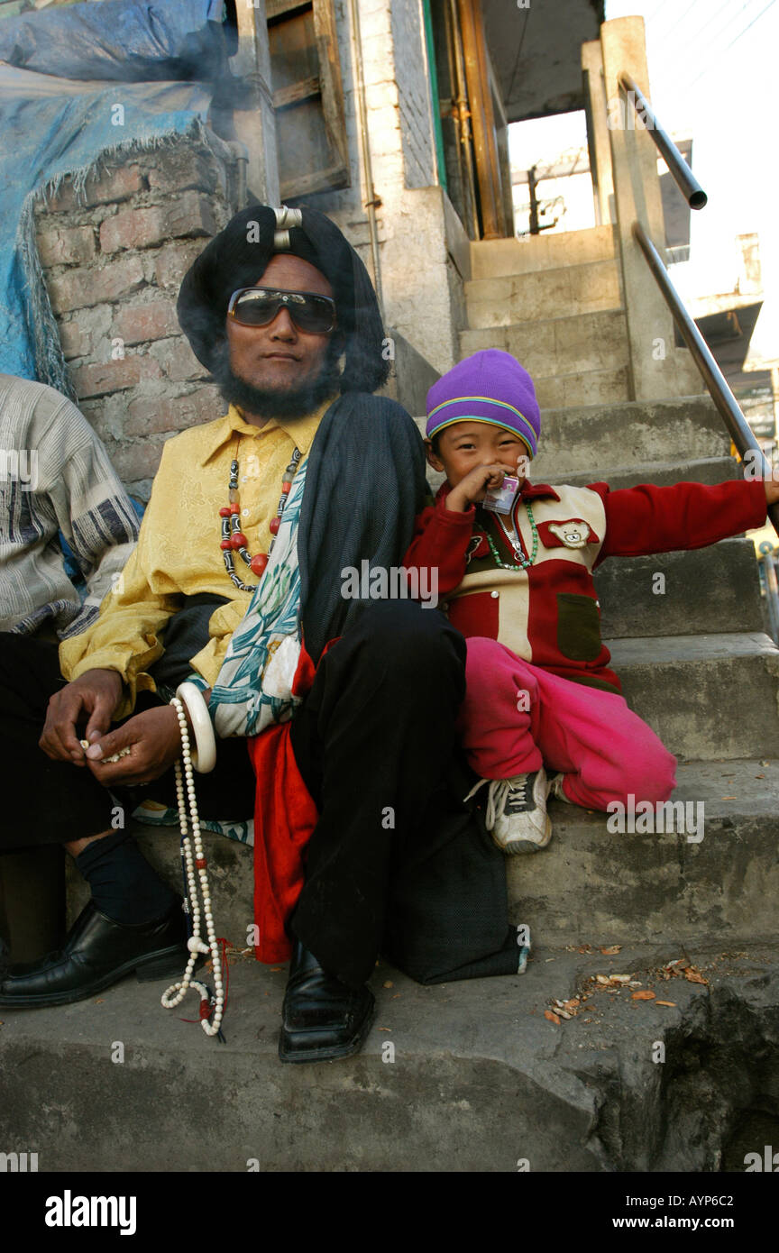 A Khampa tribe man with his son Dharamsala Himachal Pradesh India Stock Photo
