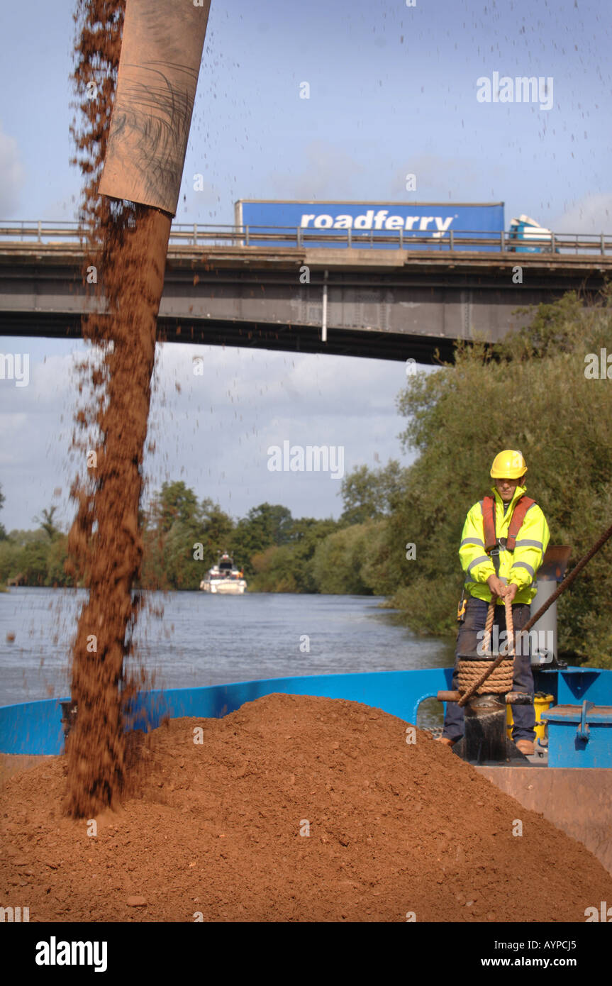 SAND AND GRAVEL IS LOADED AT THE CEMEX DOCK AT RIPPLE QUARRY