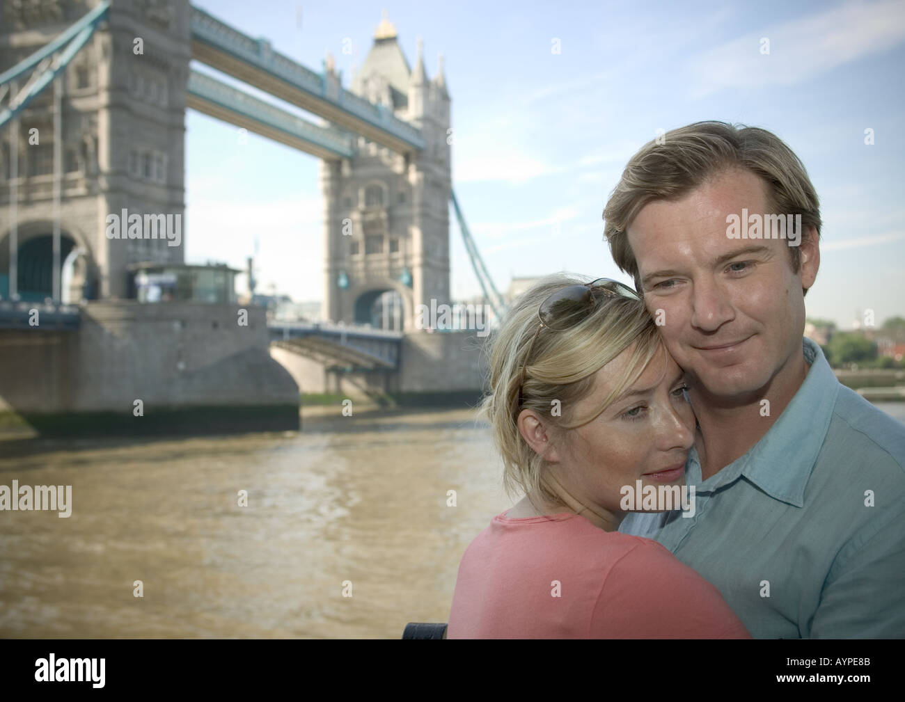 couple standing near tower bridge in london Stock Photo