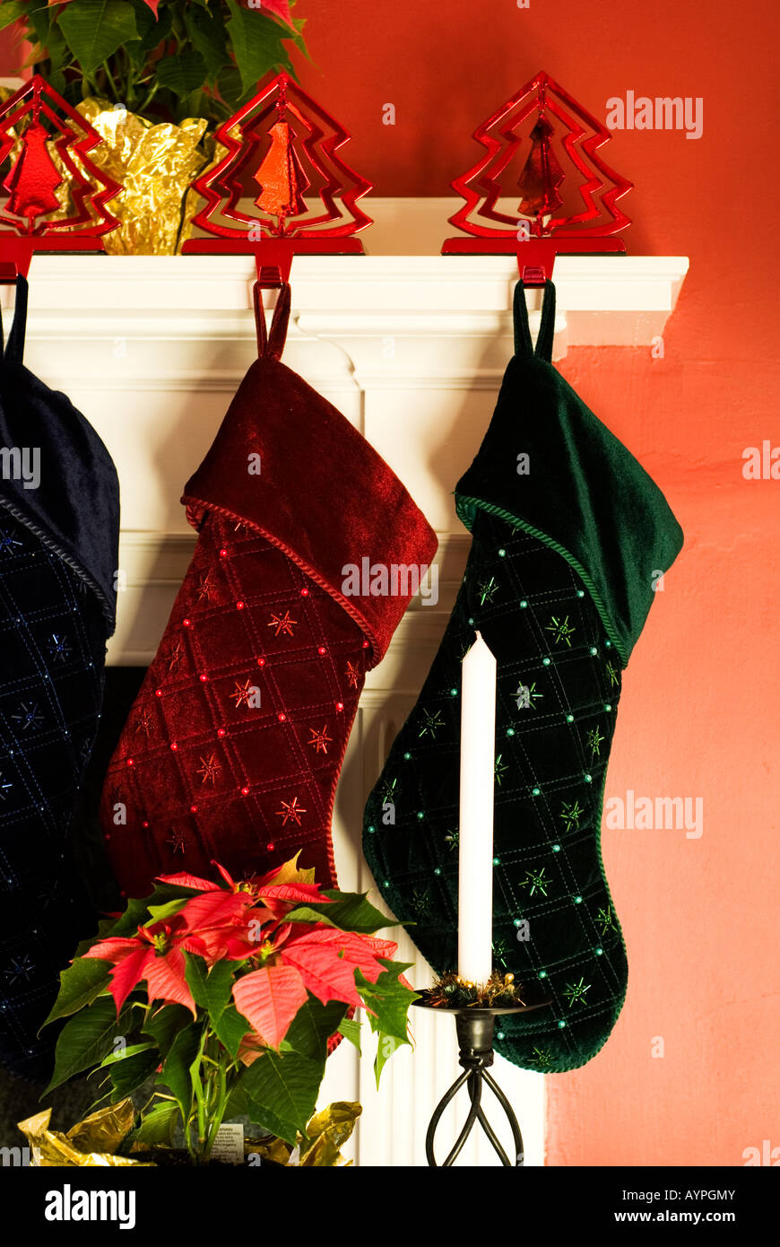 https://c8.alamy.com/comp/AYPGMY/christmas-stockings-hung-by-a-fireplace-AYPGMY.jpg