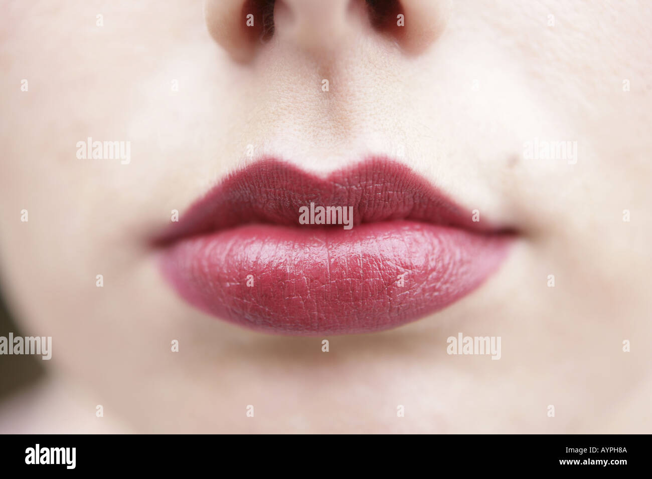 An extreme close up of the lips of a fair woman Stock Photo