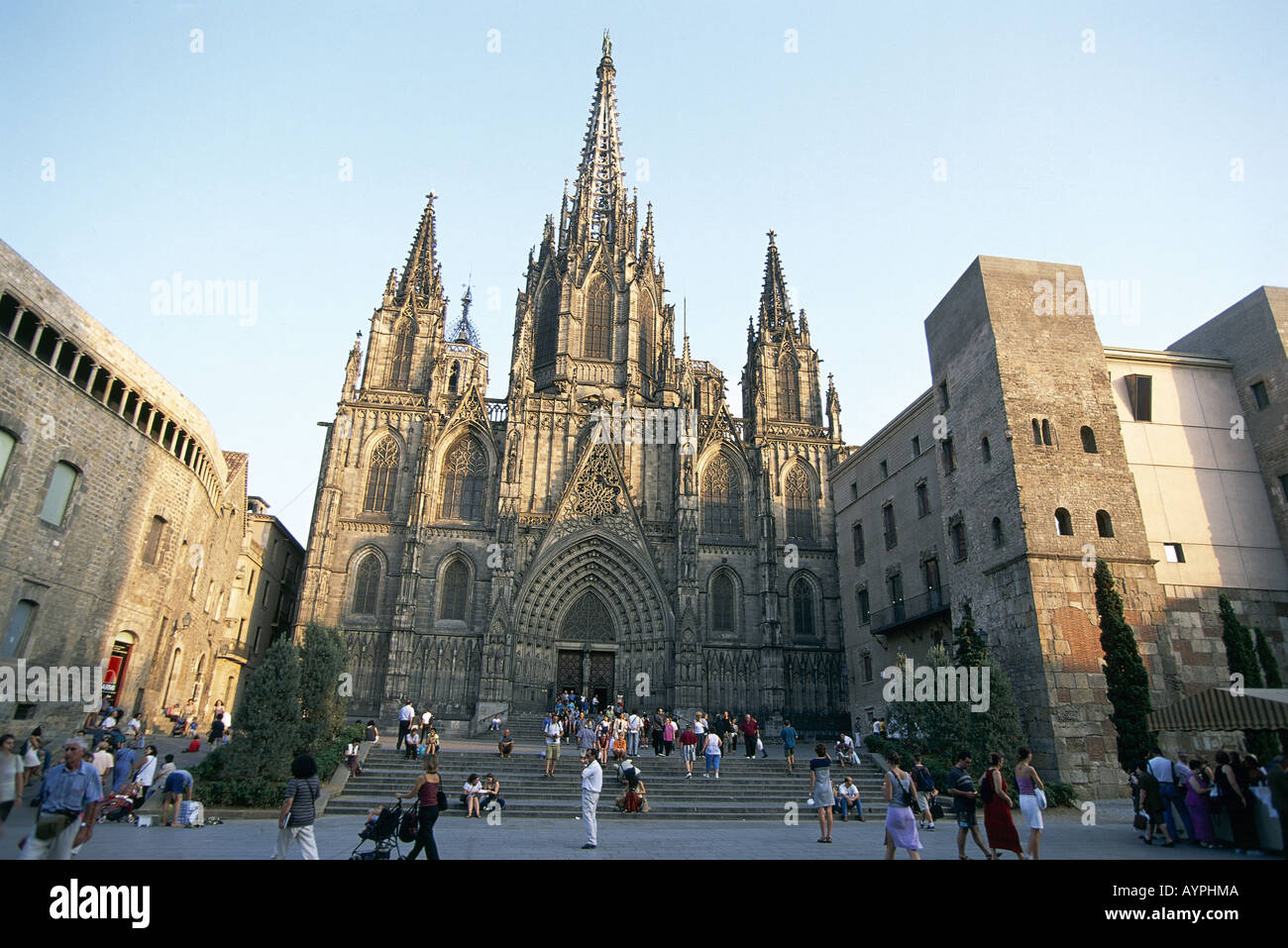 Entrance to Barcelona Cathedral Catalan Gothic architecture People walking up steps to entrance Stock Photo