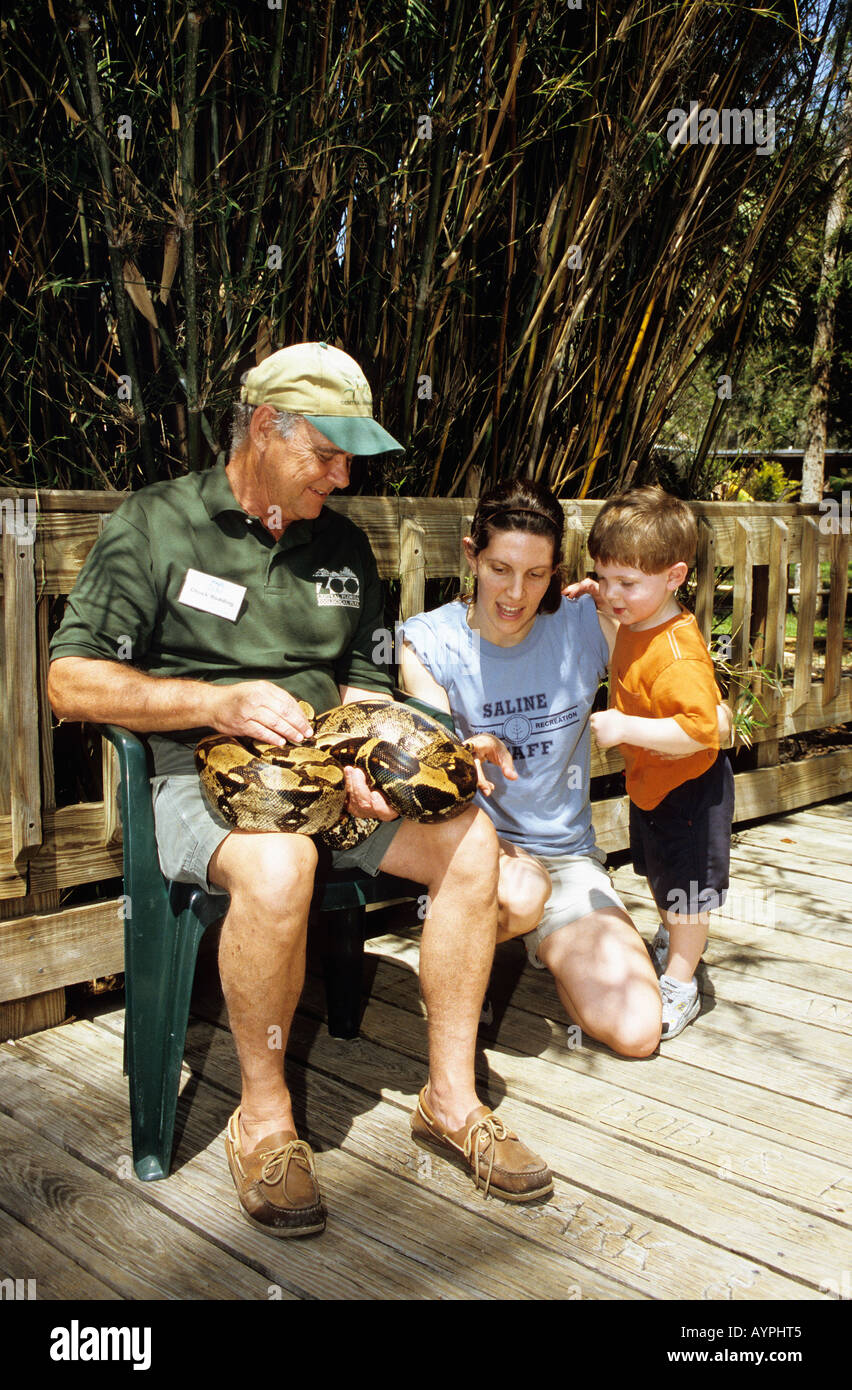 Keeper with a Python and visitors at Central Florida Zoo Stock Photo