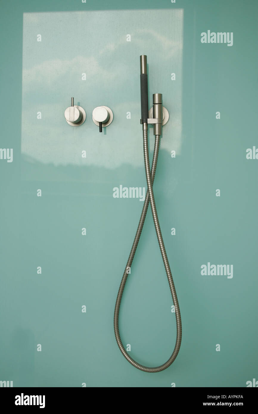 Hand shower with two knobs in the bathroom Stock Photo Alamy