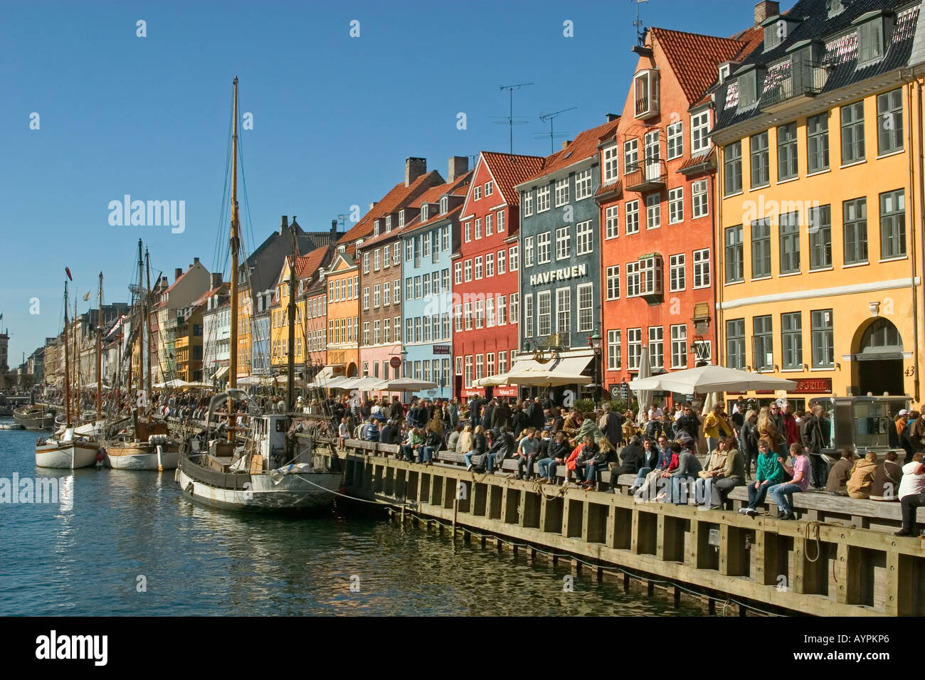 Nyhavn New Harbour once the Red Light District now a famous tourist  attraction with many cafés Copenhagen Denmark Stock Photo - Alamy
