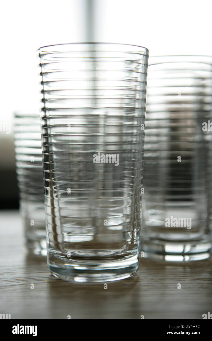 Some empty glasses kept on a table Stock Photo