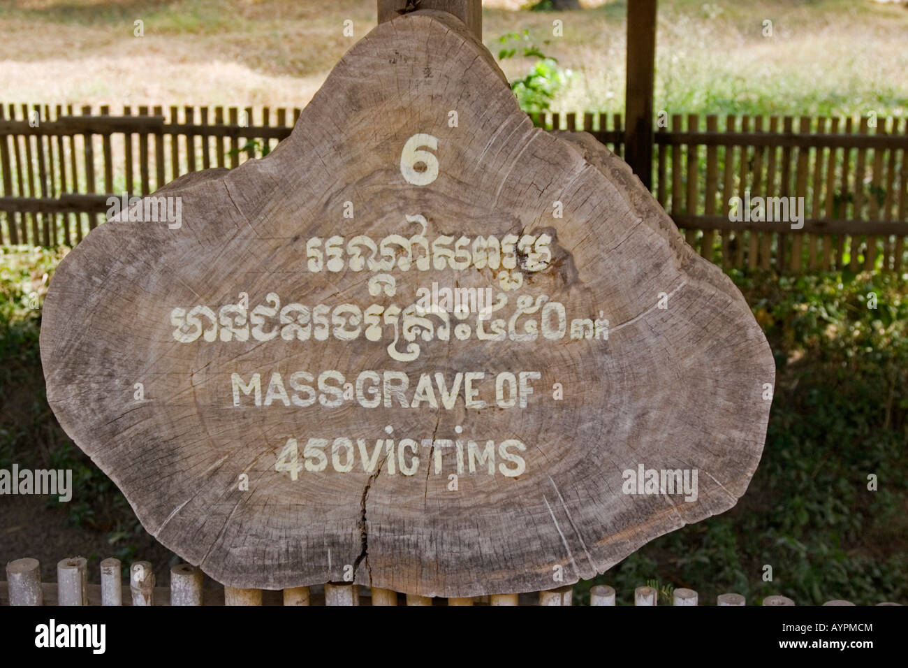 Sign marking a mass grave where 450 victims of the Khmer Rouge killing fields are buried, Phnom Penh, Cambodia, Southeast Asia Stock Photo