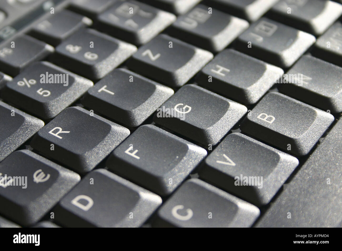 Close up of computer keys on a black keyboard Stock Photo
