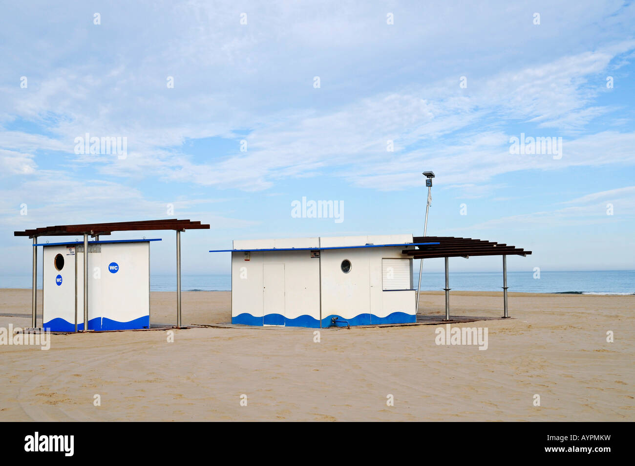 Toilets and restaurant on an empty beach, Gandia, Costa Blanca, Valencia Province, Spain Stock Photo