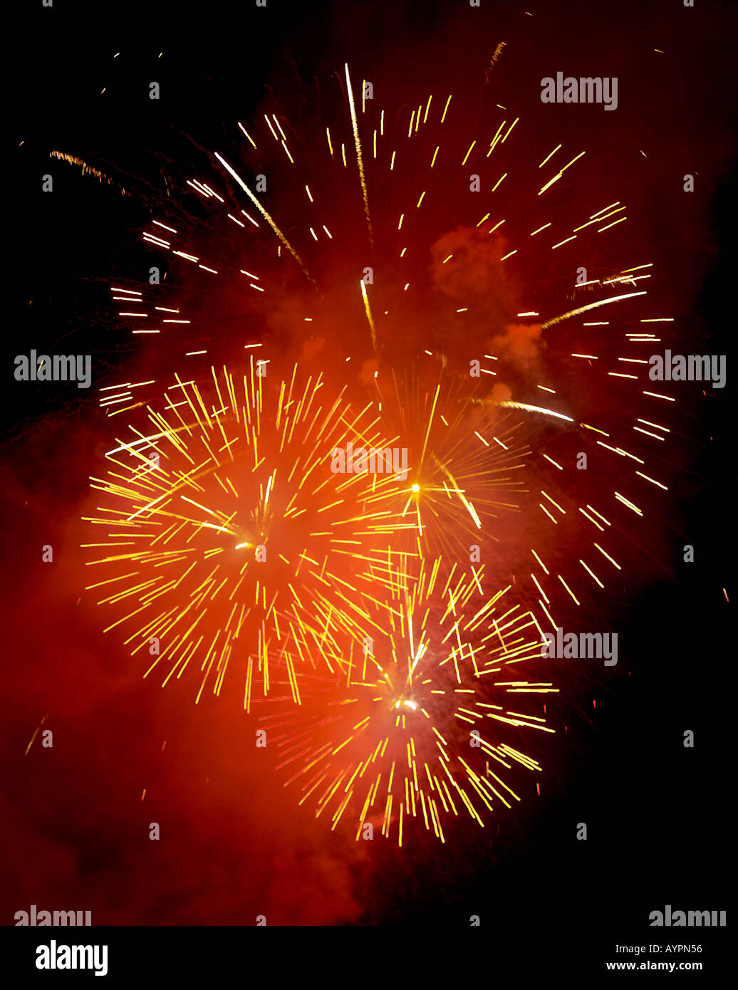 Fire crackers bursting in the sky at night Stock Photo Alamy
