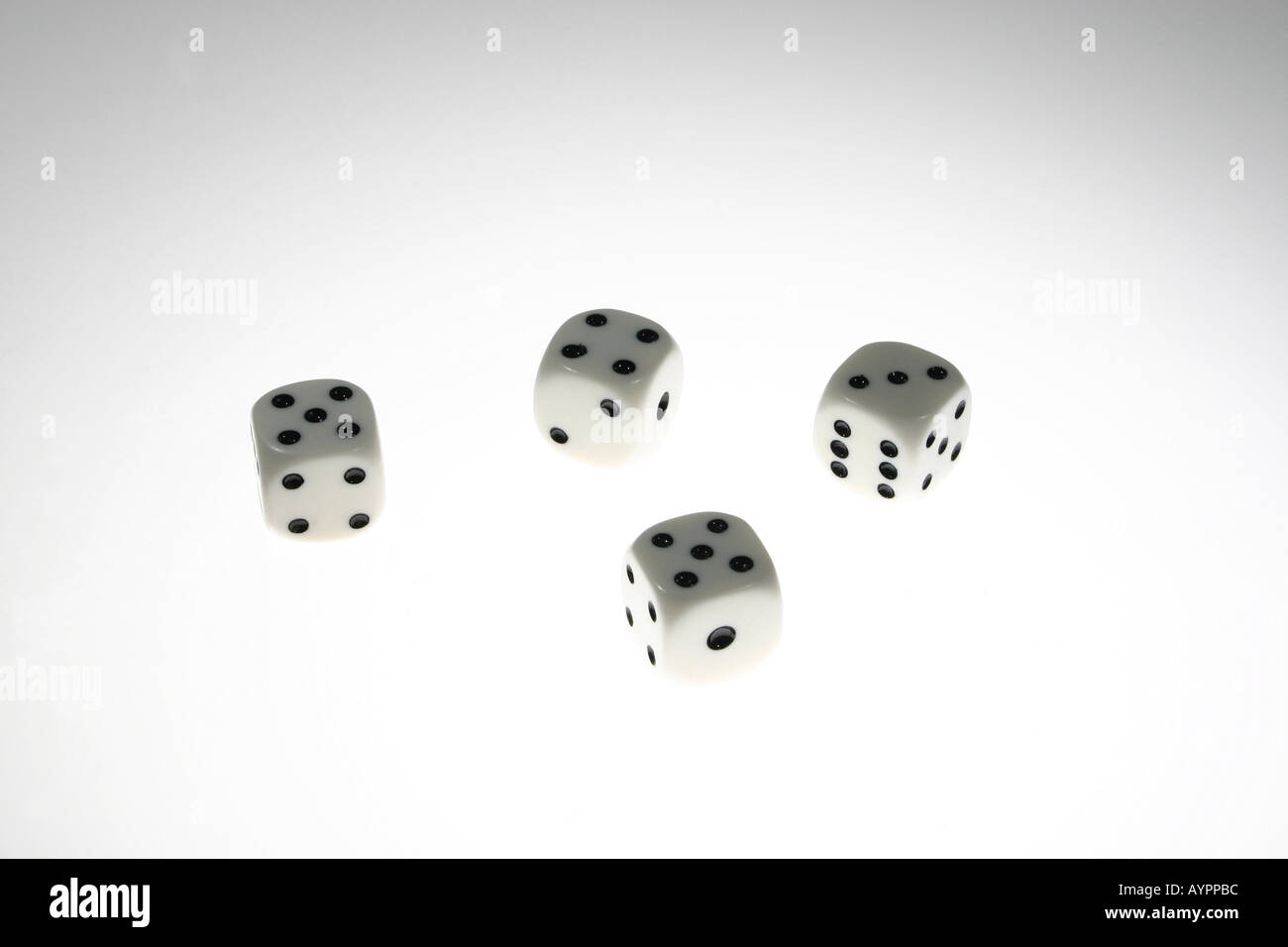 Four dices against a white background Stock Photo