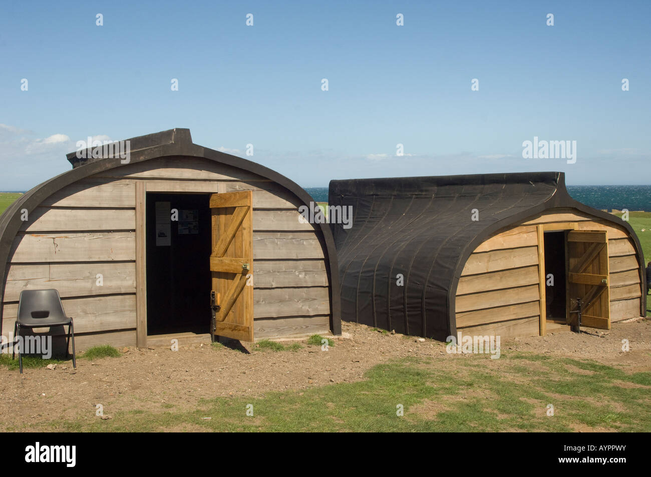 Restored National Trust fishermans huts, Lindisfarne, Northumberland, UK Stock Photo