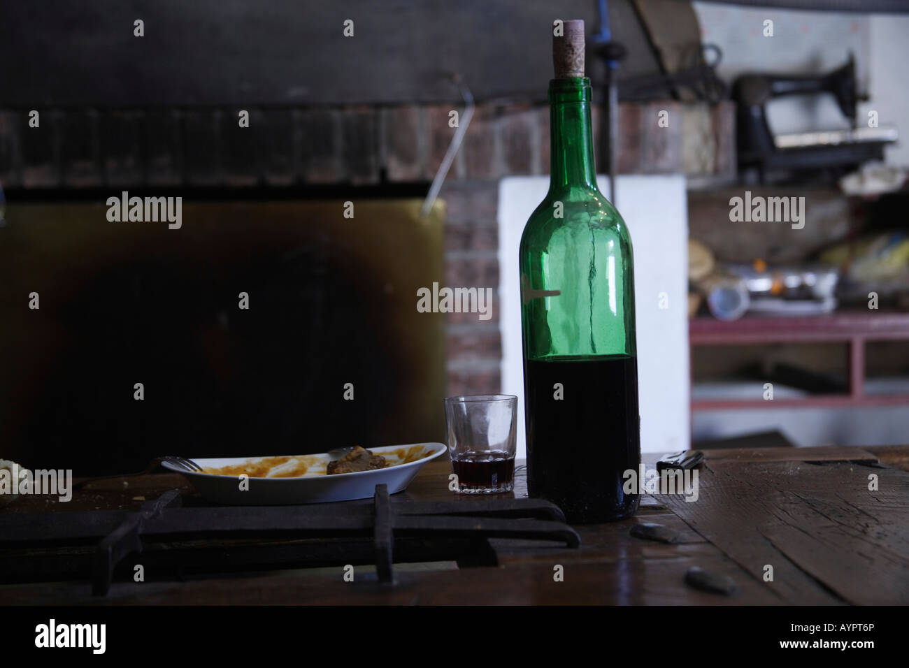 Bottle of wine in a rustic kitchen in La Rioja, Spain Stock Photo