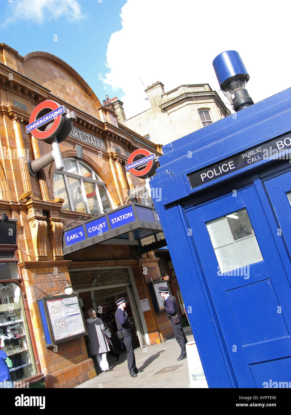LONDON, UK. Old-fashioned blue police telephone box outside Earl's Court Road underground station. Stock Photo